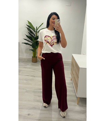 Pantalón con cinturón burdeos