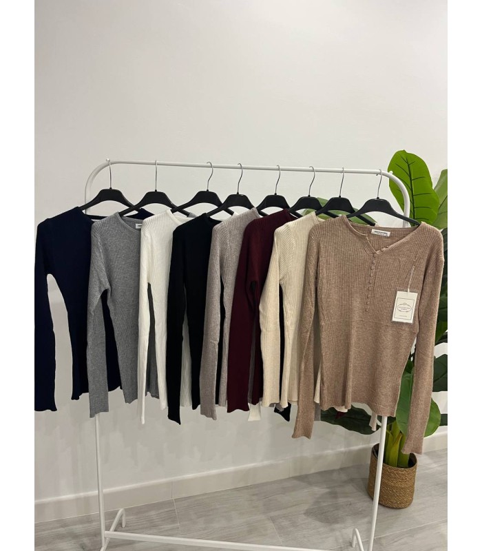 Jersey pegado botones