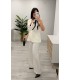 Conjunto chaqueta sin mangas y pantalón blanco