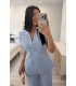 Conjunto chaqueta sin mangas y pantalón celeste